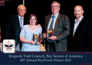 Margo Sue and Jim Bittner receiving award 